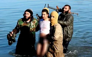 أنباء عن إعدام داعش الطيار الأردني