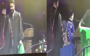 مبتعث سعودي يسجد على علم المملكة خلال حفل تخرجه بأمريكا (فيديو)