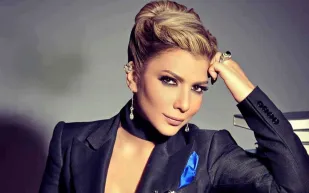 فيديو|أصالة متنكرة بالحجاب والنظارات بعد اتهامها بحيازة المخدرات