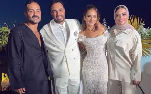 من هو صاحب أغرب إطلالة في زفاف نيللي كريم؟!
