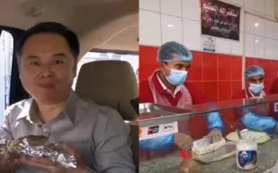 السفير الصيني يستمتع بوجبة طعام تقليدية سعودية (فيديو)