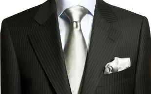 رابطة العنق والملابس الفاخرة تثيران جدلاً واسعًا في البرلمان الفرنسي