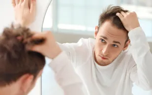 دراسة: مينوكسيديل منخفض الجرعة يعالج الصلع بفعالية الجرعات العالية