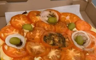 بيتزا ميسي في ميامي تتحول إلى طبق أيقوني بسعر 22.5 دولار