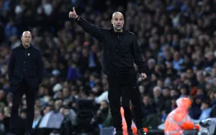 غوارديولا يوضح كيف نجح مانشستر سيتي في فرض رقابة على محمد صلاح؟