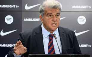 كيف رد خوان لابورتا على اتهامات تشافي هيرنانديز حول ميسي؟