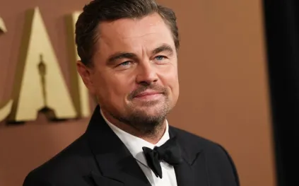 ظهور نادر لعائلة ليوناردو دي كابريو في احتفال فيلمه الجديد 