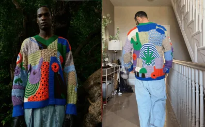 محمد صلاح يلفت الأنظار بسترة صوفية برسومات كرتونية 