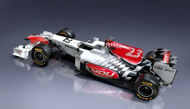 بالصورة...عرض سيارة فورمولا 1 مطلية بالذهب ومرصعة بالماس في أبوظبي