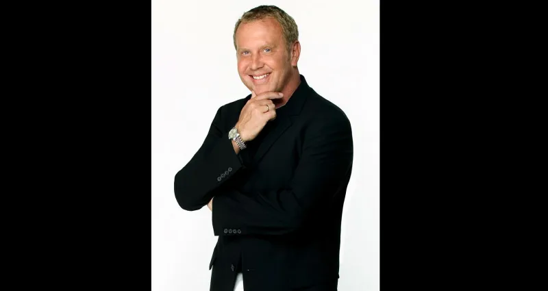 المصمم العالمي مايكل كورس لـ "الرجل" :  المظهر المثالي غير محبب دائما