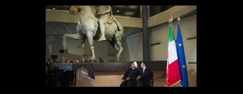 بالصور.. إيطاليا تغطي التماثيل العارية من أجل الرئيس الإيراني 