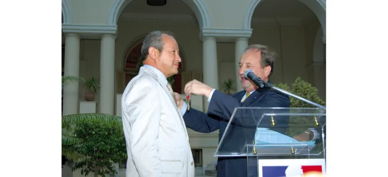  نجيب ساويرس لـ"الرجل" سأشتري جزيرة للاجئين 