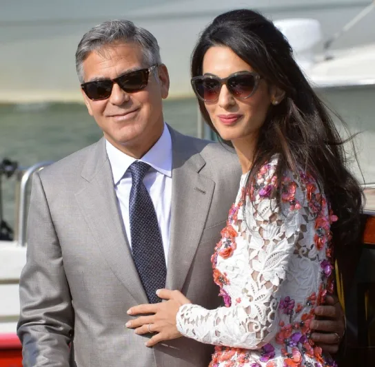 جورج وأمل كلوني يساعدان 3 آلاف طفل لاجئ سوري.. هذا ما قدماه