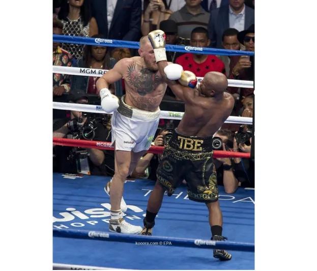 بالصور مايويذر يهزم مكجريجور بالضربة القاضية