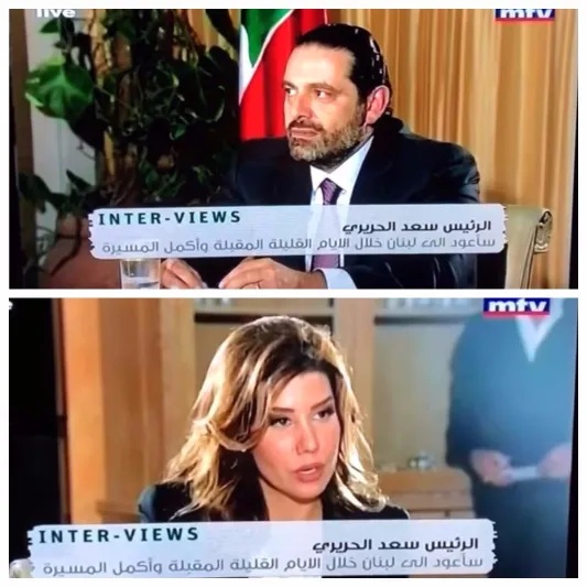 شاهد| من الرجل الذي ظهر في مقابلة الحريري.. ونظر إليه بغرابة؟