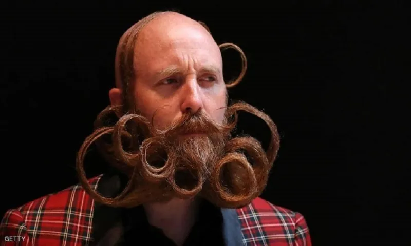 أشكال حلزونية وأطوال لا تصدق.. تعرف على بطولة العالم للحى والشوارب «فيديو وصور»