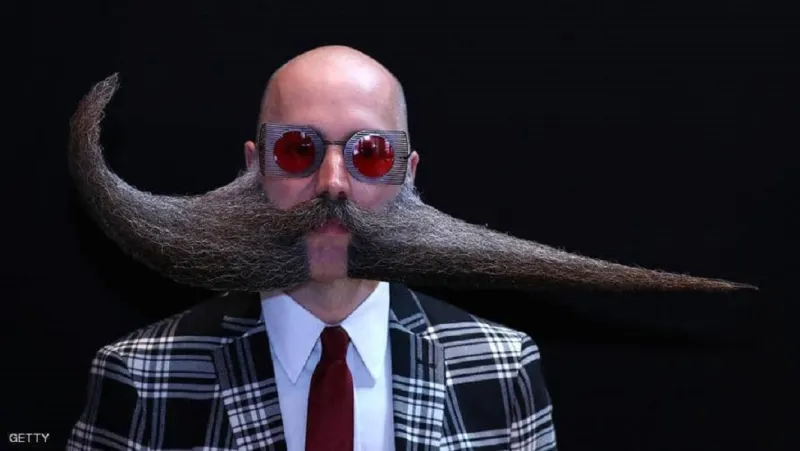 أشكال حلزونية وأطوال لا تصدق.. تعرف على بطولة العالم للحى والشوارب «فيديو وصور»