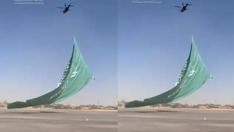 احتفالاً باليوم الوطني الـ90..أضخم علم سعودي يُحلق في سماء المملكة (فيديو)