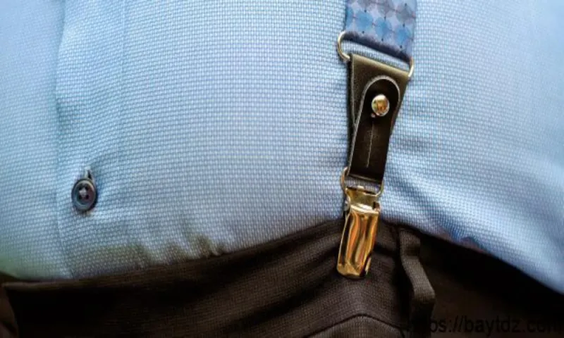 حيل بسيطة لإخفاء ترهلات البطن بملابسك