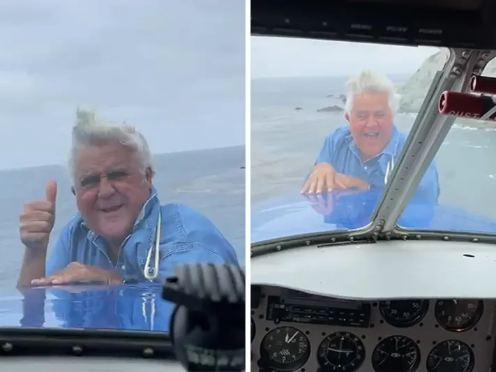 مذيع يتعلق بمقدمة طائرة أثناء تحليقها فوق البحر (فيديو)