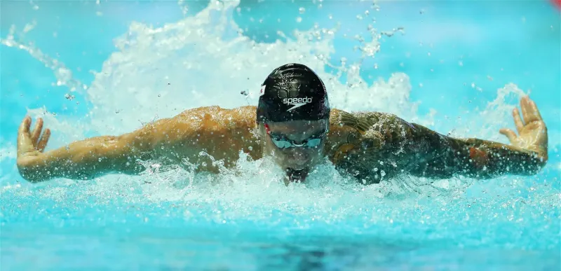 لماذا يرتدي السباحون في أولمبياد طوكيو قبعتين؟!