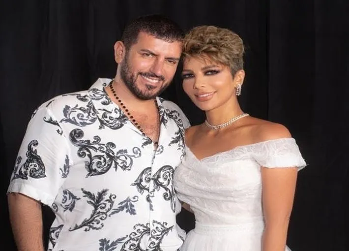 "صوتك له رنين أجراس الكنائس".. وصلة غزل متبادلة بين أصالة وزوجها