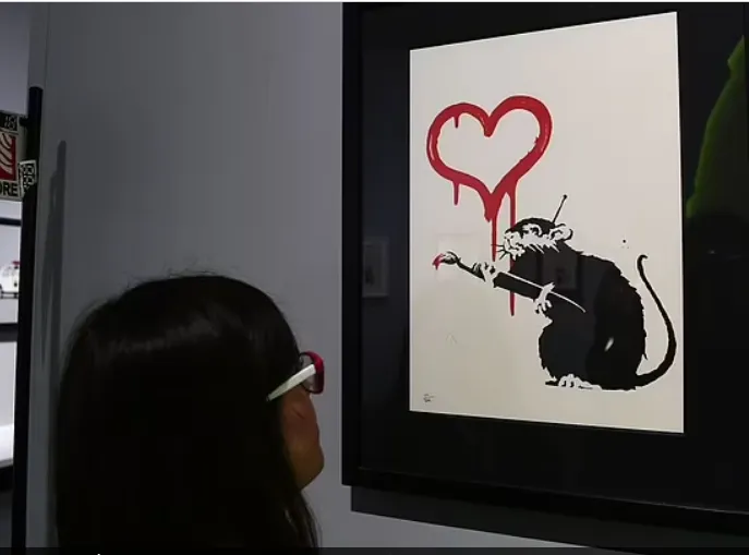 «فأر الحب» لوحة جديدة لفنان الشارع بانكسى بمزاد علني (صور)