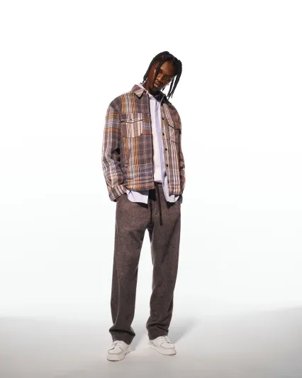 Missoni.. من وحي إبداعات الرسّام الإيطاليّ جيوليو توركاتو 