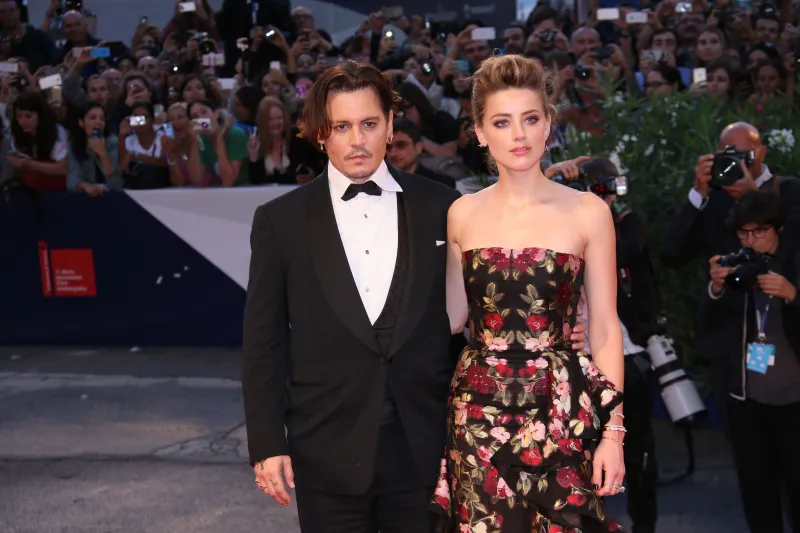 بعد أن أعلنت إفلاسها.. أمبر هيرد تتوصل لتسوية مع جوني ديب