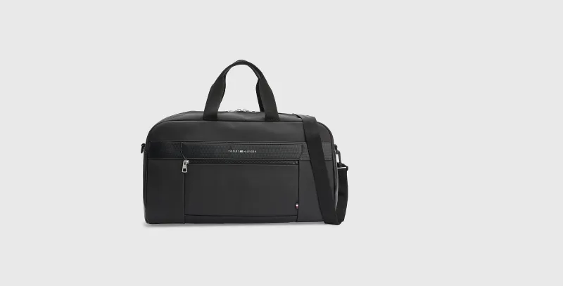 شنط "تومي هيلفيغر" الرجالي.. إضافة أكثر أناقة لعالم الرجال