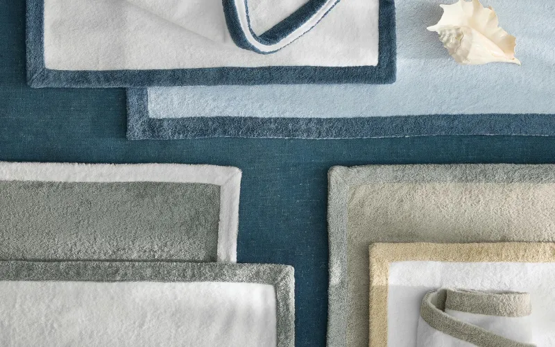 استمتع بفخامة العطلة مع أفضل المناشف من العلامات الفاخرة هذا الصيف