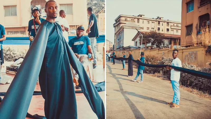 مصمم أزياء  يدخل موسوعة غينيس بأطول أكمام في العالم (صور)