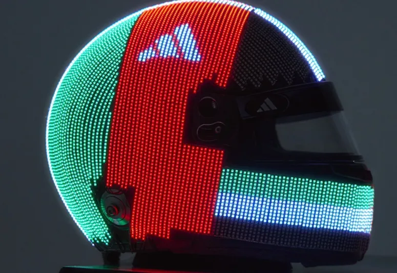 ثورة بصرية في فورمولا 1: أديداس تكشف خوذة تتحول إلى لوحة رقمية مضيئة