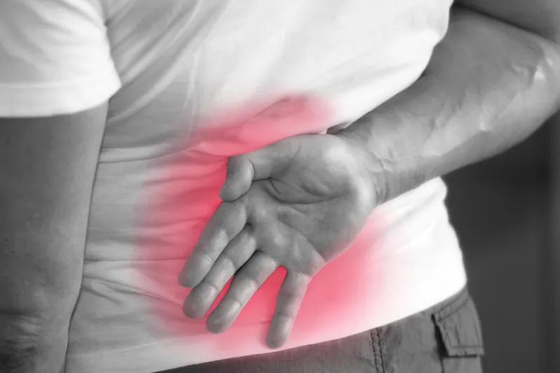 هل زيادة الوزن هي السبب الخفي لآلام أسفل الظهر؟ 