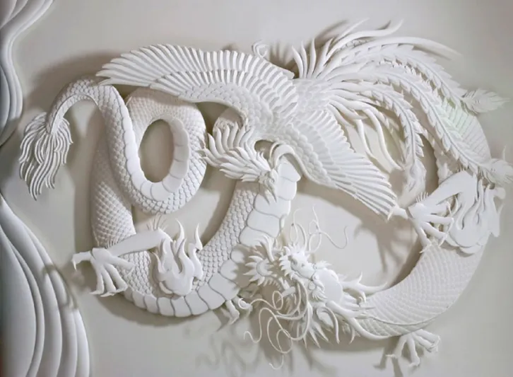 بالصور : فن تفريغ الورق ..ابداع