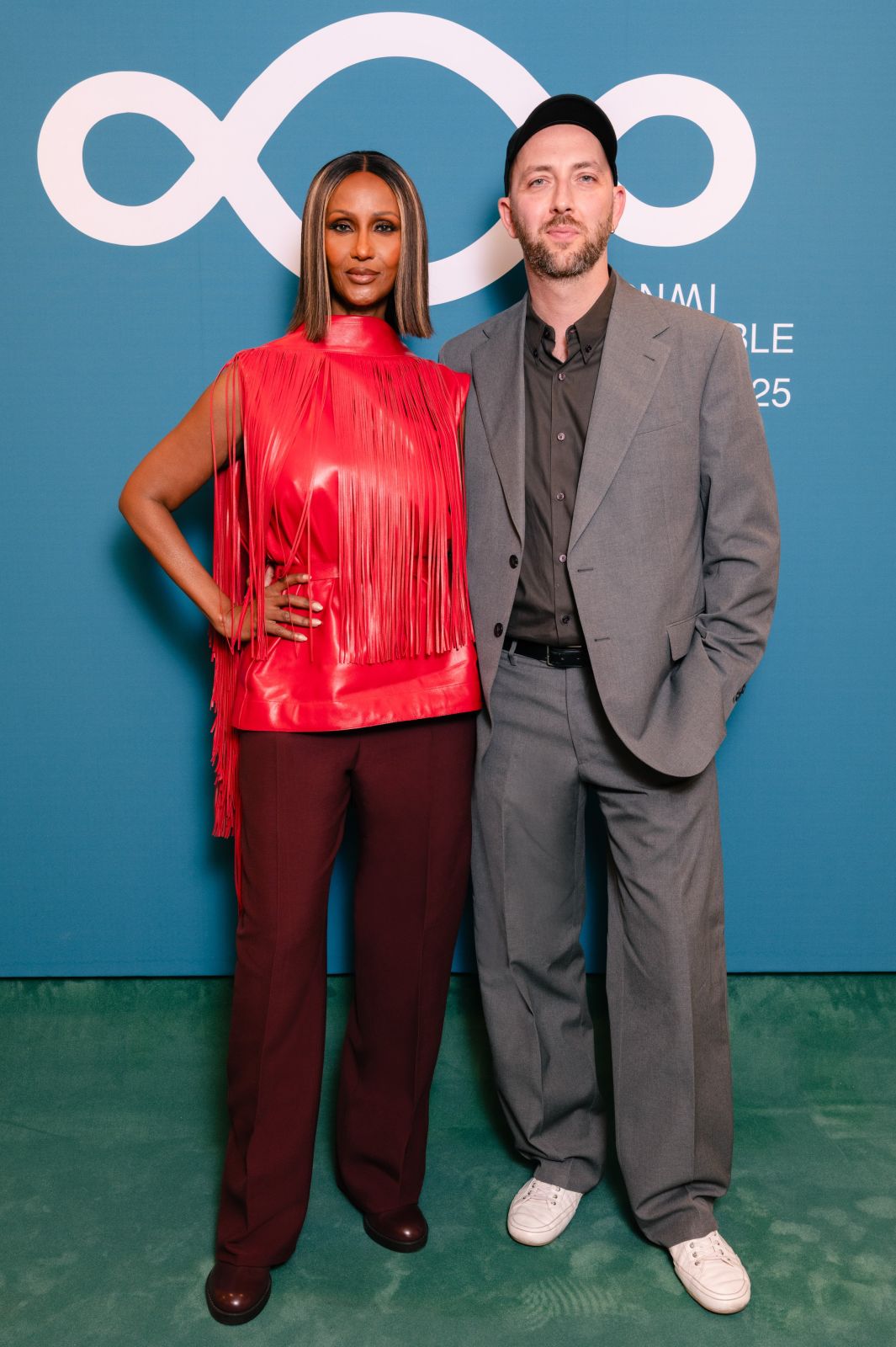 ماتيو تامبوريني والعارضة إيمان.